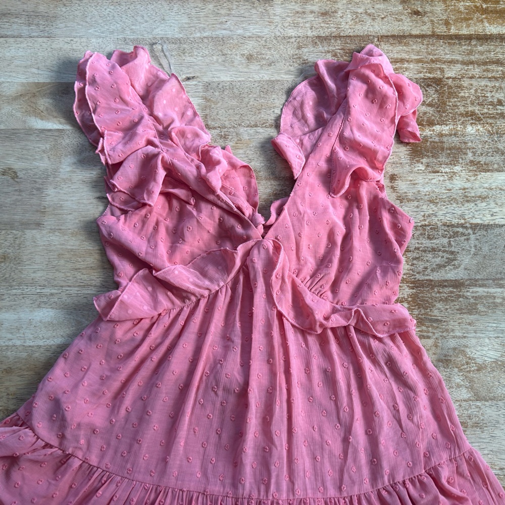Pink Babydoll dress with ruffles and bow detail - Francesca’s